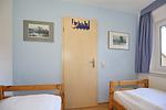 erstes Schlafzimmer mit Einzelbetten - Haus 54b - Top-Hundeurlaub