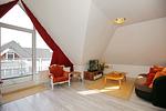 Wohnzimmer mit Blick zur Terrasse - Wohnung 63 - Top-Hundeurlaub