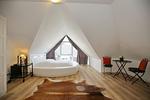 Schlafzimmer mit Doppelbett - Wohnung 63 - Top-Hundeurlaub