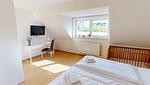 Schlafzimmer - Wohnung B - Top-Hundeurlaub