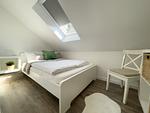 Schlafzimmer - Kapitänshaus FeWo 3 - Top-Hundeurlaub