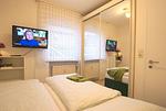 Schlafzimmer - Ferienwohnung Küstenperle - Top-Hundeurlaub