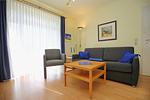 Wohnzimmer mit Sofa - Wohnung 20 - Top-Hundeurlaub