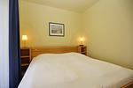 Schlafzimmer mit d - Wohnung 20 - Top-Hundeurlaub