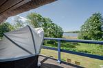 Gartenblick - Kreativhaus am See direkt am See mit Terrasse und Strandkorb - Top-Hundeurlaub