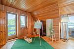 Wohnzimmer - Kreativhaus am See direkt am See mit Terrasse und Strandkorb - Top-Hundeurlaub