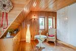 Wohnzimmer - Kreativhaus am See direkt am See mit Terrasse und Strandkorb - Top-Hundeurlaub