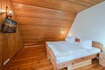 Schlafzimmer - Kreativhaus am See direkt am See mit Terrasse und Strandkorb - Top-Hundeurlaub