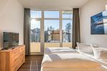 Ferienwohnung SeeNest Röbel - Schlafzimmer mit TV - SeeNest - Top-Hundeurlaub