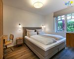 Schlafzimmer - Ferienwohnung Strandstuuv - Top-Hundeurlaub