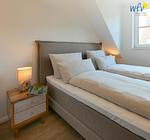 Schlafzimmer - Ferienwohnung Watt'n Kiek - Top-Hundeurlaub