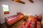 Dies ist das Schlafzimmer 2 mit 2 Einzelbetten der Fewo Waldblick - Ferienwohnung Waldblick - Top-Hundeurlaub