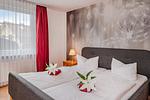 Schlafzimmer - Ferienwohnung Waldhaus 4.2 mit Terrasse und Grill - Hunde sind willkommen - Top-Hundeurlaub