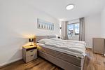 Schlafzimmer - Ferienwohnung Strandhafer Rosenhagen bei Travemünde - Top-Hundeurlaub