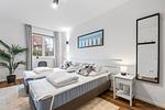 Schlafzimmer - Ferienwohnung Strandnest Rosenhagen bei Travemünde - Top-Hundeurlaub
