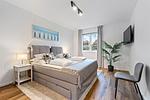Schlafzimmer - Ferienwohnung Strandnest Rosenhagen bei Travemünde - Top-Hundeurlaub