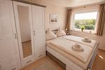 Schlafzimmer - Weitblick inkl. Saisonstrandkorb - Top-Hundeurlaub