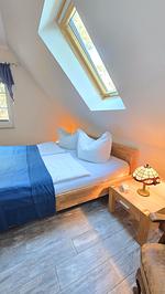 Schlafzimmer - Ferienhaus Küstenzeit – Ihr Refugium in Trassenheide - Top-Hundeurlaub