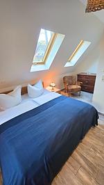 Schlafzimmer - Ferienhaus Küstenzeit – Ihr Refugium in Trassenheide - Top-Hundeurlaub