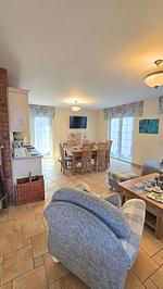 Wohnzimmer - Ferienhaus Küstenzeit – Ihr Refugium in Trassenheide - Top-Hundeurlaub