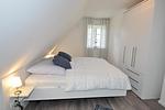 Schlafzimmer - Doppelhaushälfte Dorfhus - Top-Hundeurlaub