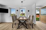 Wohnzimmer - Ferienwohnung Winningmay III Füsing - Top-Hundeurlaub