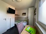 Schlafzimmer - Birkenhain 2a - Lastering Ferienhäuser & Apartments - Top-Hundeurlaub