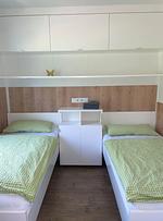 Schlafzimmer - Am See I - Lastering Ferienhäuser & Apartments - Top-Hundeurlaub