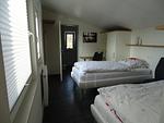 Schlafzimmer - Birkenhain 2c - Lastering Ferienhäuser & Apartments - Top-Hundeurlaub