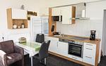 Küche / Küchenzeile - Birkenhain 3c - Lastering Ferienhäuser & Apartments - Top-Hundeurlaub