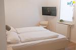 Schlafzimmer - Ferienwohnung Bente - Top-Hundeurlaub