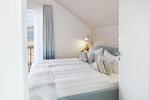 Schlafzimmer - Ferienhaus D Schilfhütte Neukamp - Top-Hundeurlaub