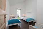 Schlafzimmer - Ferienhaus Heimathafen - Top-Hundeurlaub