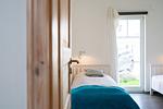Schlafzimmer - Ferienhaus Heimathafen - Top-Hundeurlaub