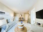 Wohnbereich mit Couch, Sessel, Wlan, TV - Strandquartier L. A. - Top-Hundeurlaub