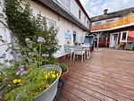 Unseren Gästen steht eine gemeinsame Terrasse mit Grill und Meerblick zur Verfügung - Nordlicht - Top-Hundeurlaub