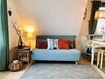 Wohnbereich mit Schlafcouch - Nordlicht - Top-Hundeurlaub