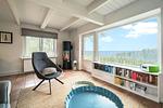 Das Wohnzimmer mit großem Panoramafenster - Strandhaus am Mühlendamm - Top-Hundeurlaub