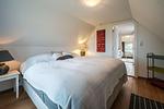 Schlafzimmer mit Meerblick und Boxspringbett (180 x 200 cm) - Strandhaus am Mühlendamm - Top-Hundeurlaub