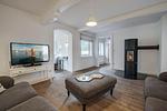 Wohnzimmer mit Kamin, TV und 2 Sofas - Bauernhaus am Mühlendamm - Top-Hundeurlaub
