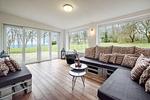 Wintergarten mit Meerblick, neben dem Wohnzimmer - Bauernhaus am Mühlendamm - Top-Hundeurlaub
