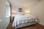 Schlafzimmer im EG mit Boxspringbett (180 x 200 cm) - Bauernhaus am Mühlendamm - Top-Hundeurlaub