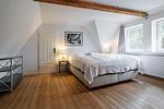 Schlafzimmer im 1. OG mit Boxspringbett (180 x 200 cm) - Bauernhaus am Mühlendamm - Top-Hundeurlaub