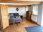 Wohnzimmer - Ferienhaus Dat groote Diekhuus Rodenäs - Top-Hundeurlaub
