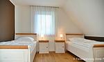 Schlafzimmer mit zwei gemütlichen Einzelbetten - Düne 7 - Top-Hundeurlaub