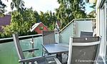 Balkon mit Tisch und Stühlen - Düne 7 - Top-Hundeurlaub