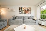 Ferienhaus Landhus Alt Schwerin Wohnzimmer mit großem Sofa - Landhus - Top-Hundeurlaub