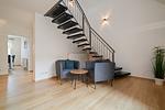Ferienhaus Landhus Alt Schwerin Wohnzimmer mit Wendeltreppe - Landhus - Top-Hundeurlaub