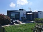 Chalet Land in Sicht mit Zaun Haus Nr. 81 - Top-Hundeurlaub