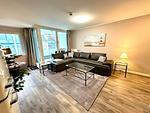 Wohnzimmer mit Zugang zum Balkon - Wohnung Nr. 203 ZingstOase - Top-Hundeurlaub